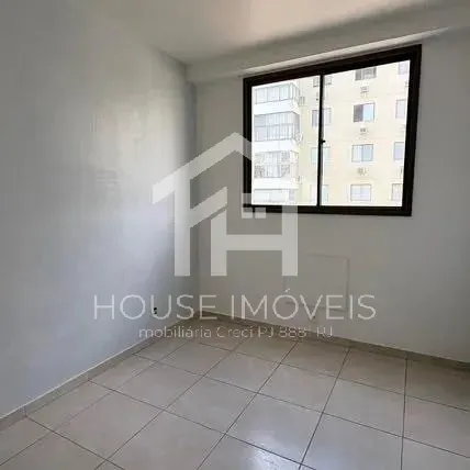 2-bedroom apartment in a building with a tennis court — photo 6