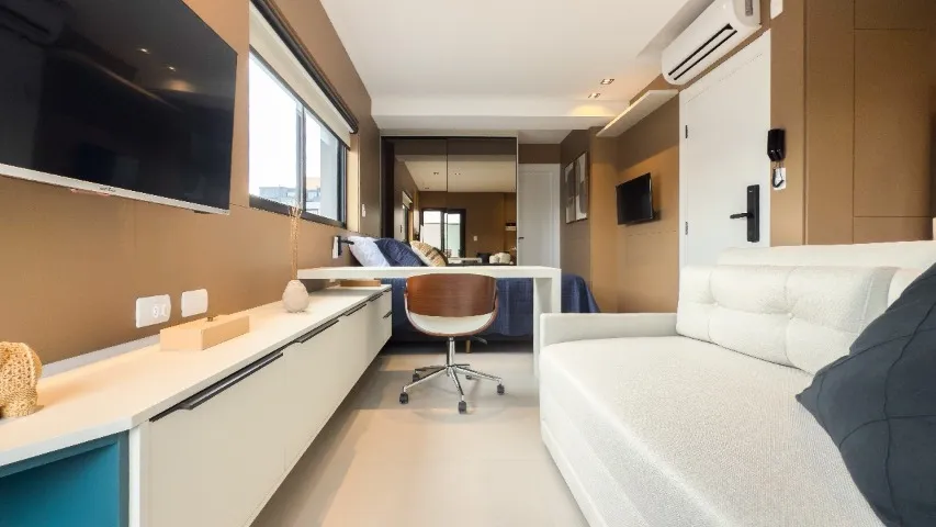 Furnished studio with open-plan kitchen and balcony — photo 3