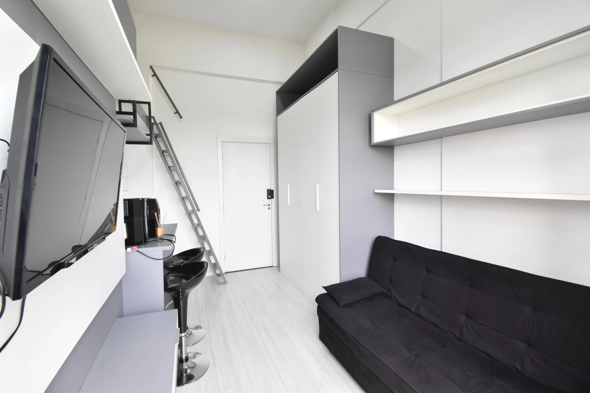 One-bedroom apartment in a building with a gym