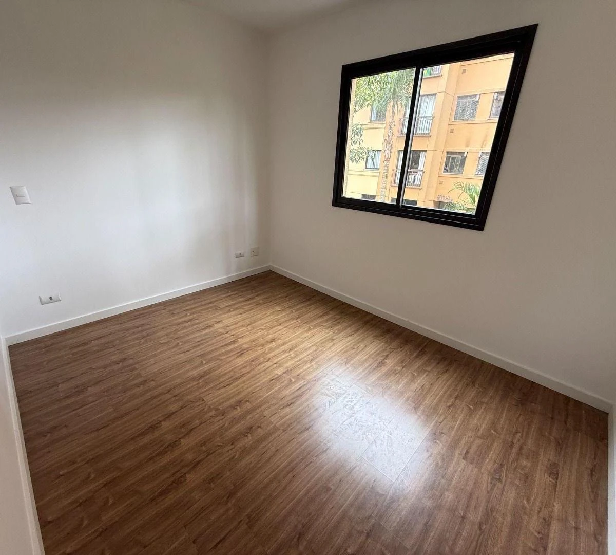 Wood or laminate floors in a 3-bedroom apartment, 65 m² — photo 20