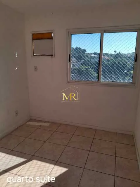 2-bedroom apartment in a building with a pool — photo 3