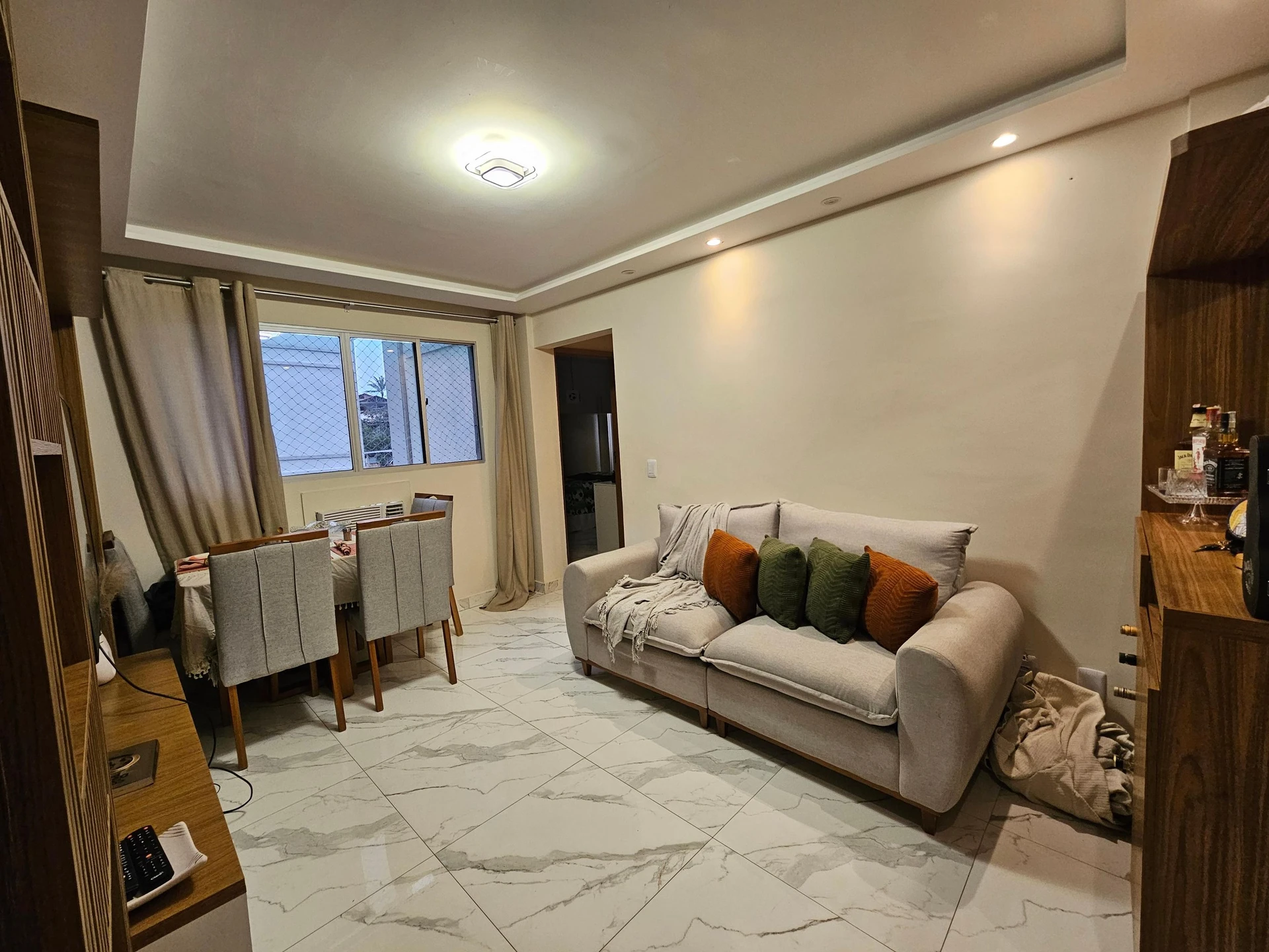 2-bedroom apartment in a building with a pool