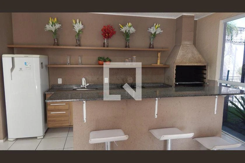 2-bedroom apartment in a building with a pool — photo 32