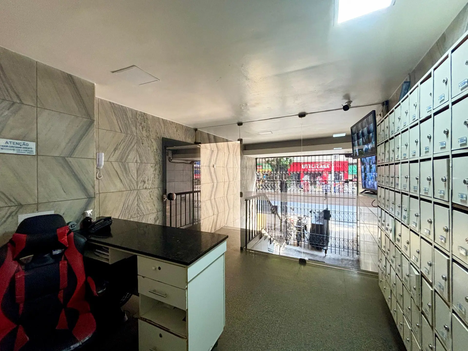 Furnished studio with 1 bedroom and a glass shower — photo 15