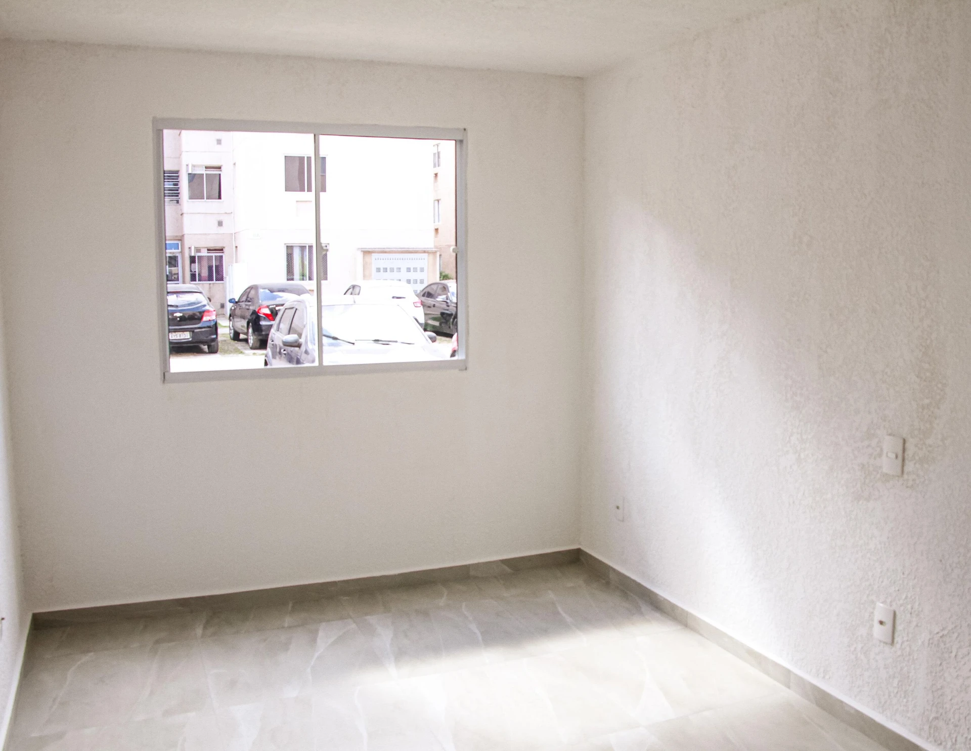 Unfurnished 2-bedroom apartment with compact kitchenette