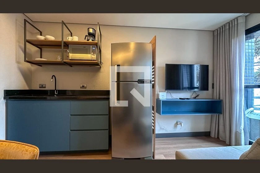1-bedroom apartment with open-plan kitchen and balcony — photo 2