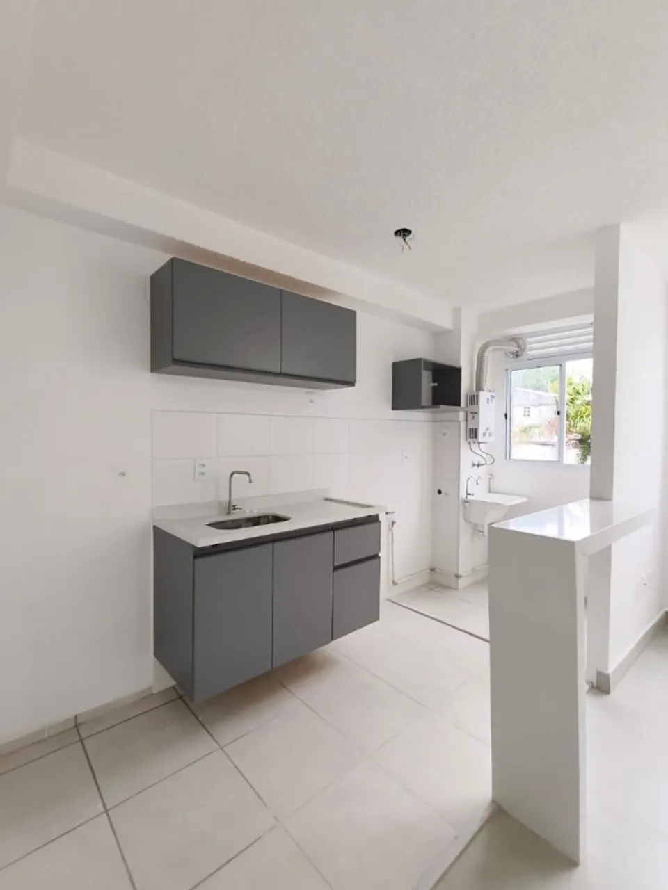 2-bedroom apartment in a building with a pool — photo 2
