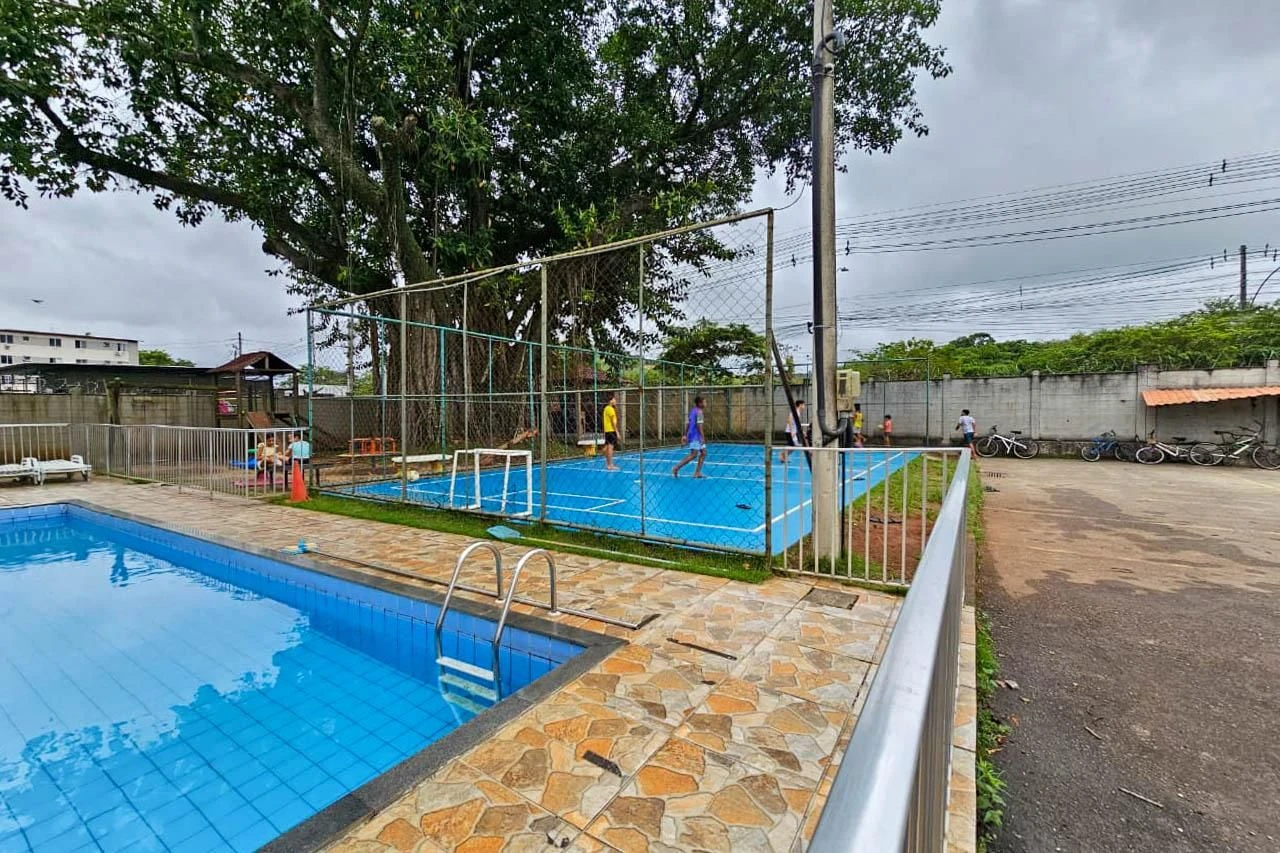 2-bedroom apartment in a building with a pool — photo 26