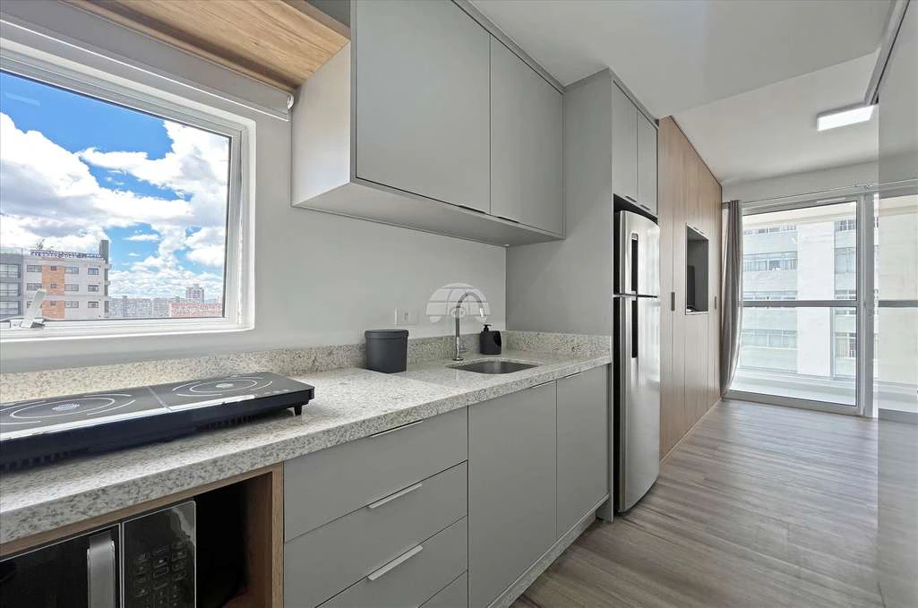 Furnished 27 m² studio with a compact kitchen corner