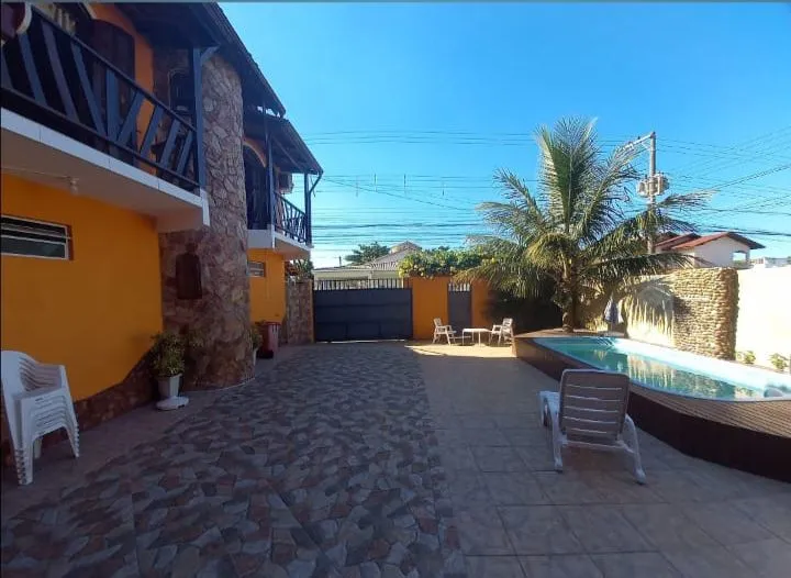 4-bedroom house with a grill on the balcony in Florianópolis
