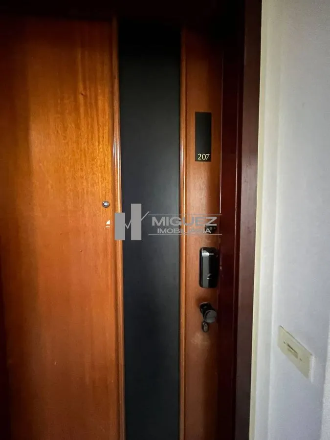 One-bedroom apartment in a building with a pool — photo 11