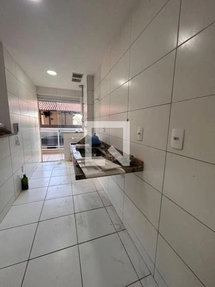 2-bedroom apartment in a building with a pool — photo 2