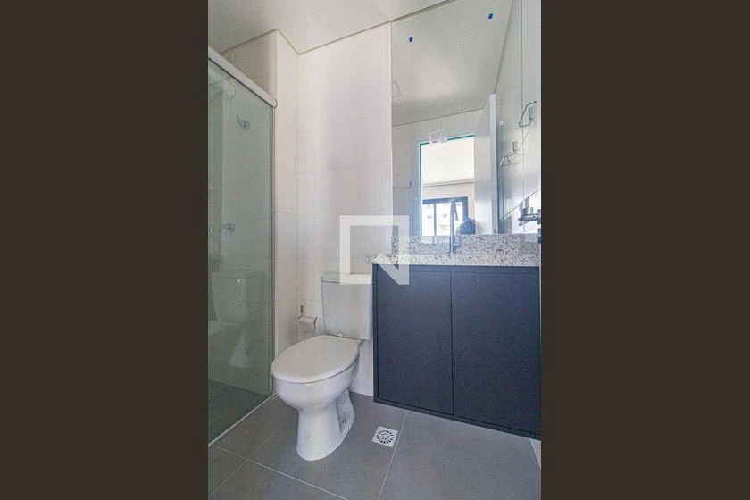 Furnished studio with 1 bedroom and open-plan kitchen — photo 8