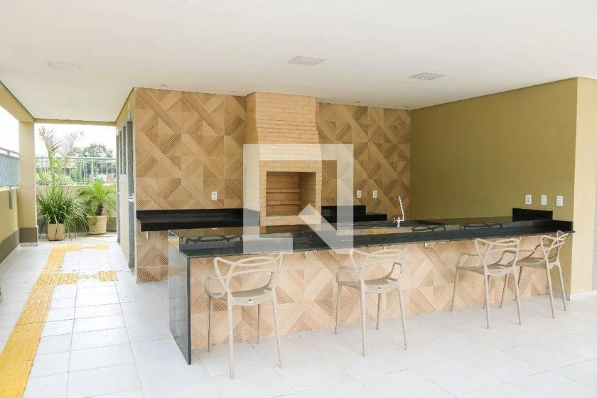 2-bedroom apartment in a building with a pool — photo 33