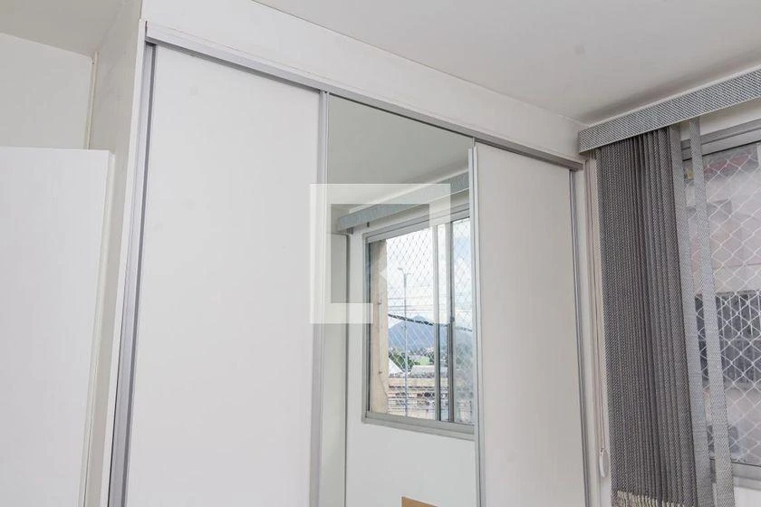 2-bedroom apartment in a building with a pool — photo 48