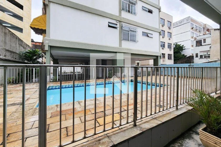 2-bedroom apartment in a building with a pool — photo 5