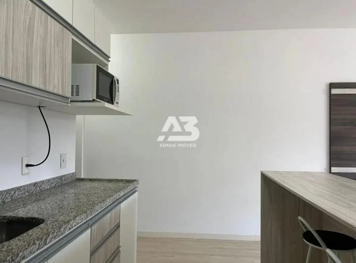 Furnished studio with open-plan kitchen and 1 bath — photo 5