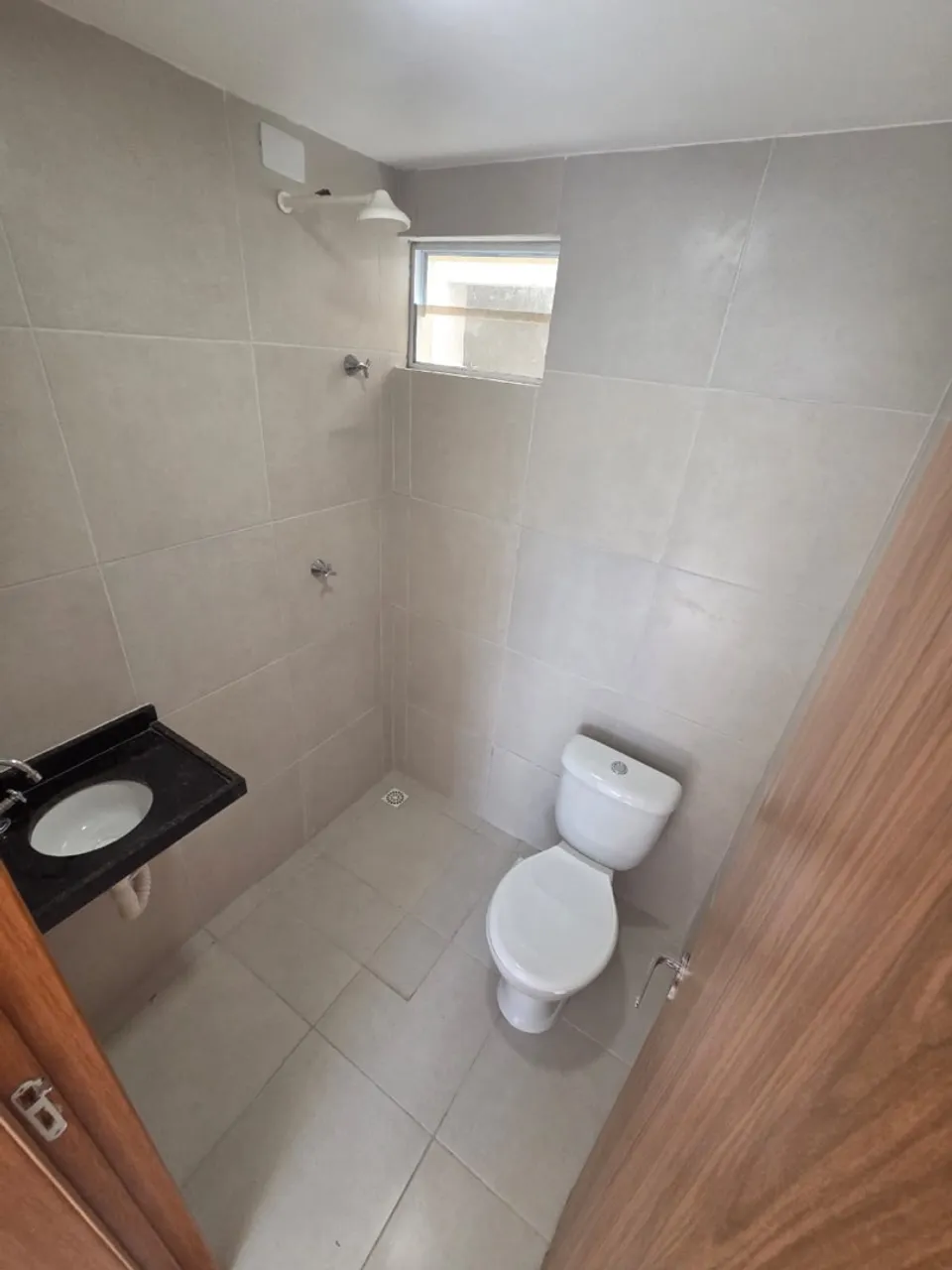 2-bedroom apartment in a building with a pool — photo 18