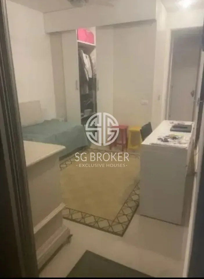 Walk-in closet in a 2-bedroom apartment, 138 m² — photo 14
