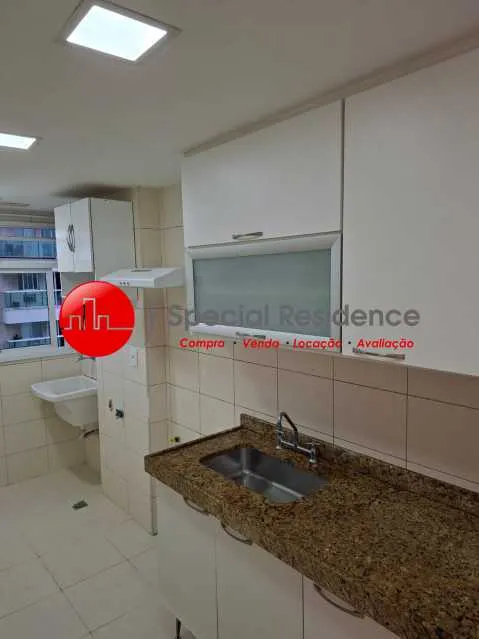 2-bedroom apartment in a building with a pool — photo 5