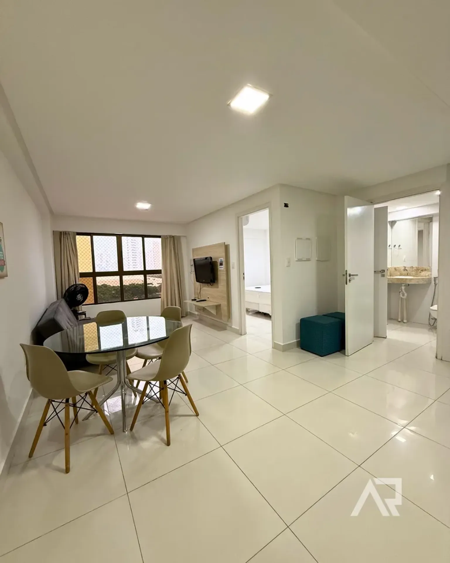 Apartment with open-plan kitchen and laundry area