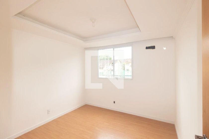 2-bedroom apartment in a building with a pool