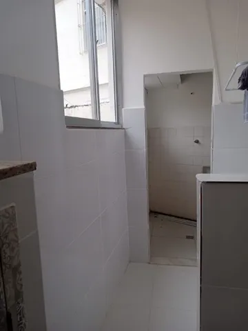 Unfurnished 3-bedroom apartment with a laundry area — photo 7