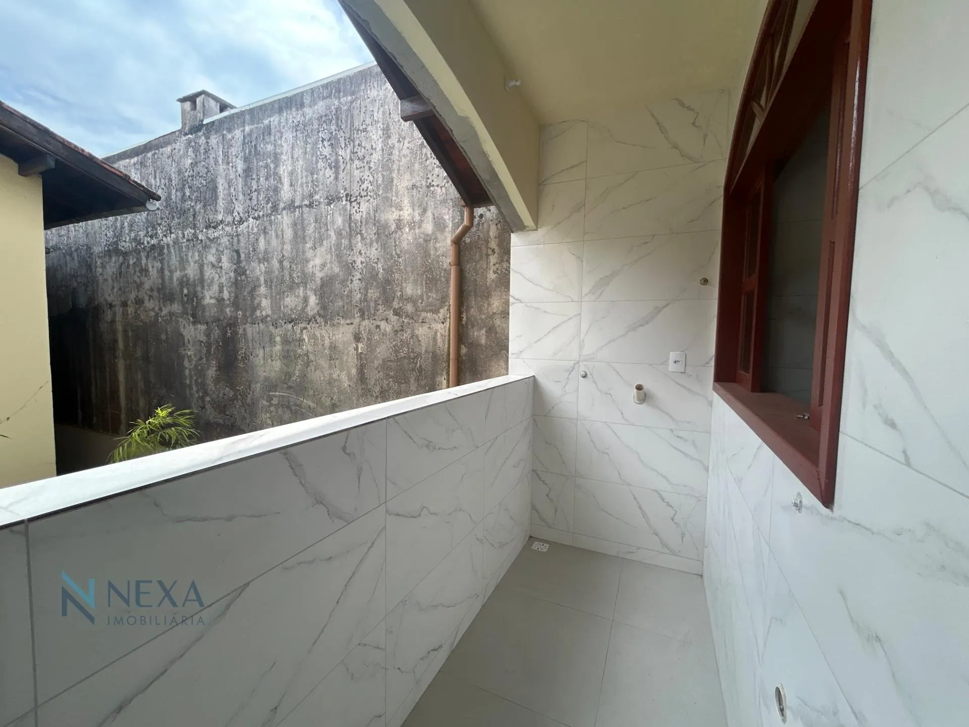 2-bedroom apartment with balcony and laundry area