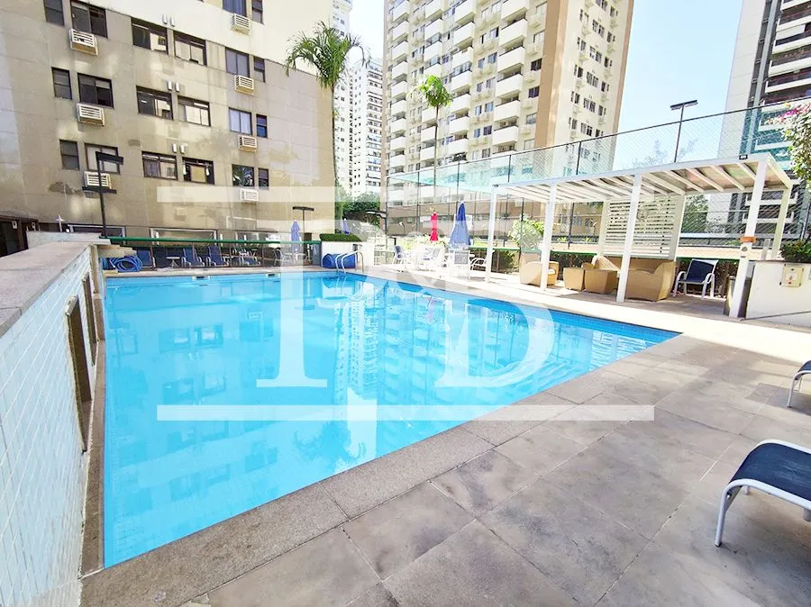 2-bedroom apartment in a building with a pool — photo 6