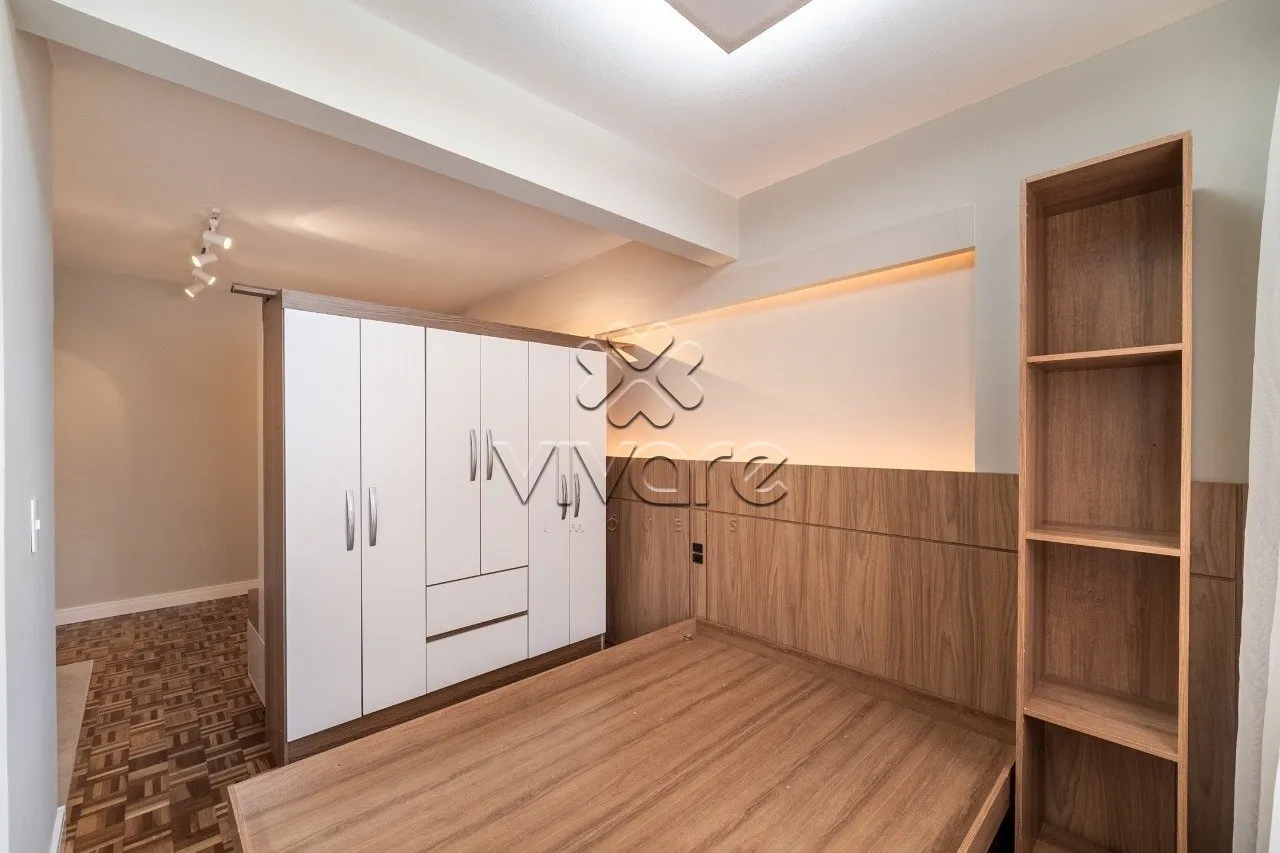 1-bedroom apartment with open-plan kitchen and electric oven — photo 8
