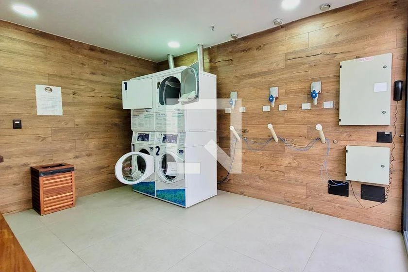 One-bedroom apartment with a washing machine — photo 19