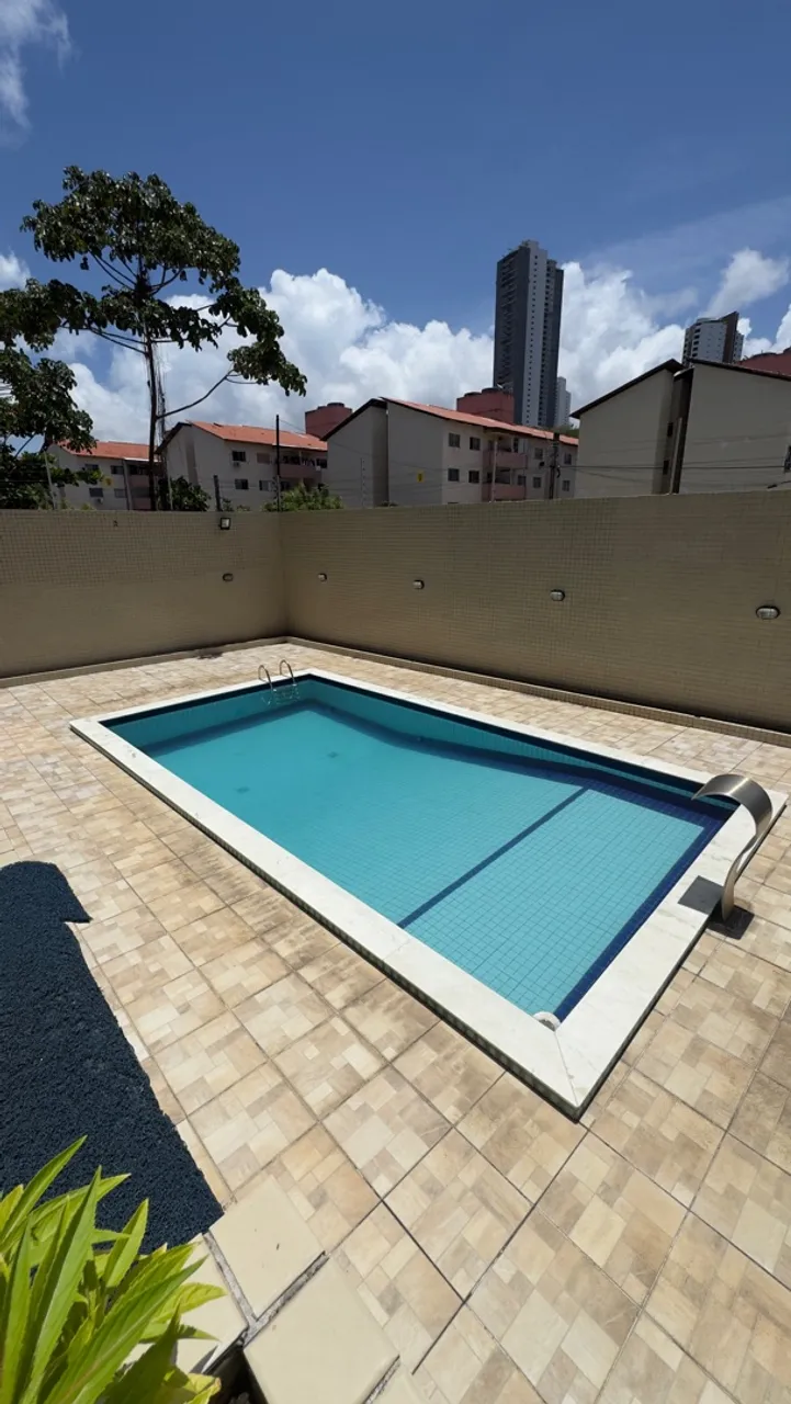 3-bedroom apartment in a building with a pool — photo 8