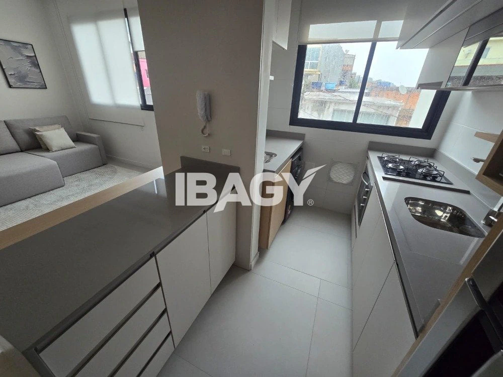 2-bedroom apartment in a building with a pool — photo 2