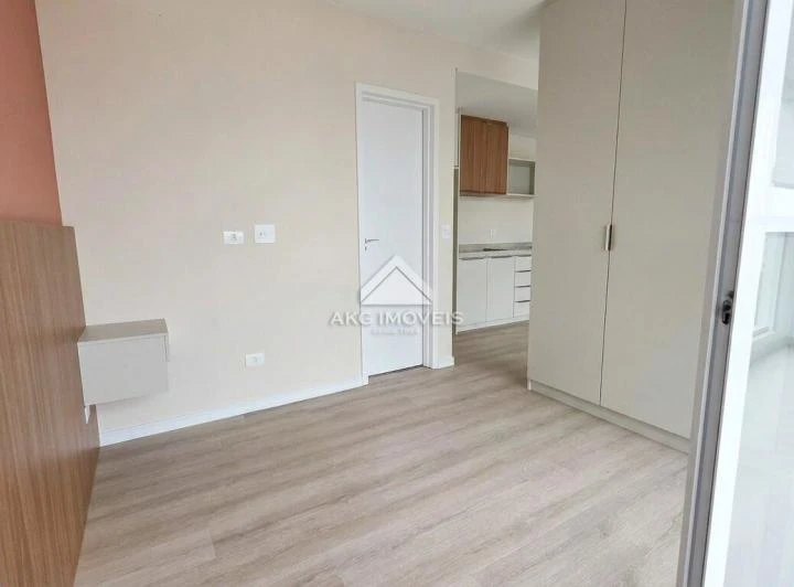 1-bedroom apartment with open-plan kitchen and balcony — photo 5