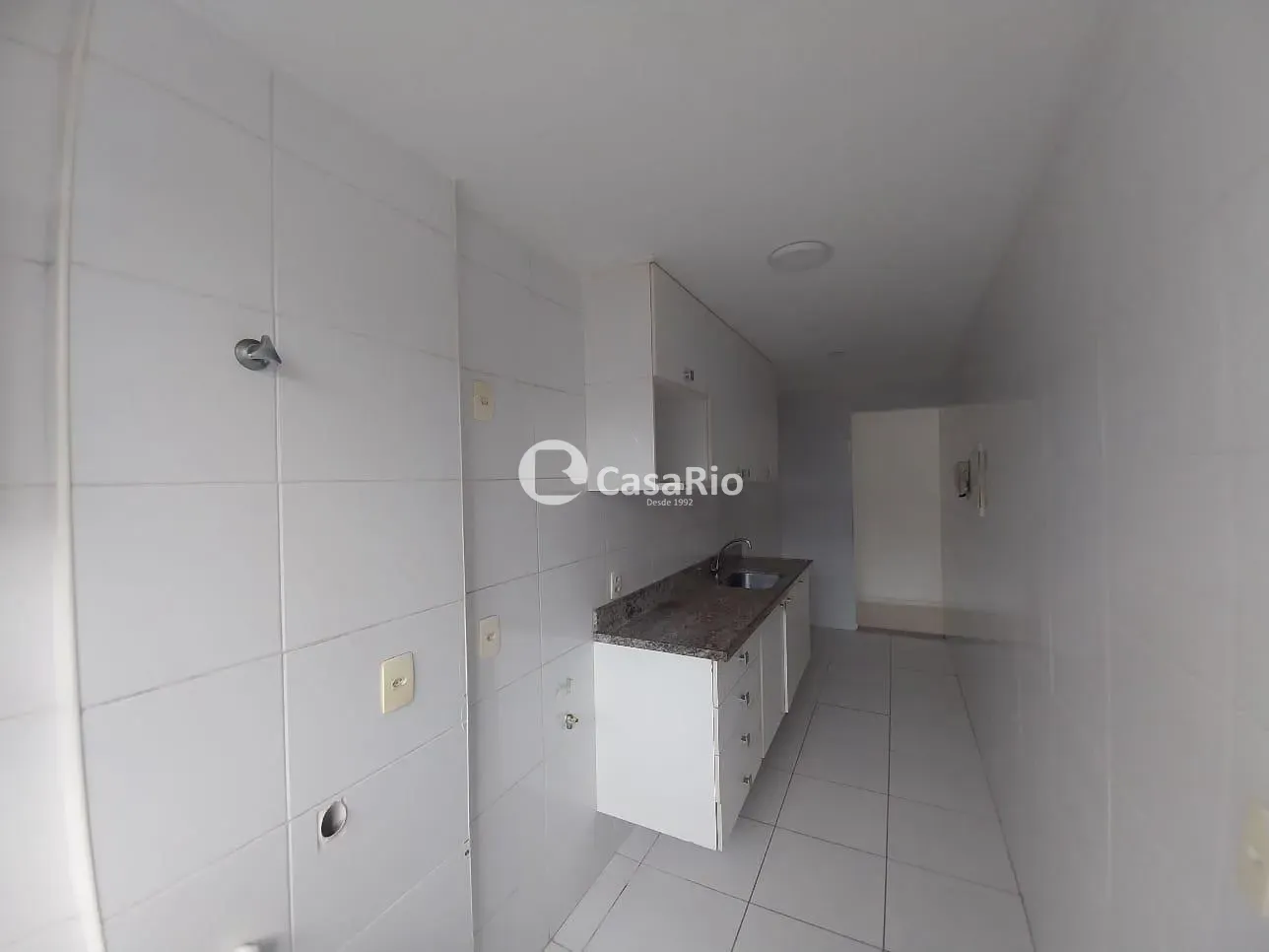2-bedroom apartment in a building with a pool — photo 2