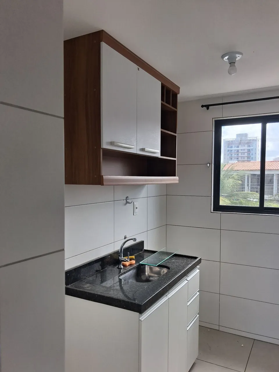 2-bedroom apartment in a building with a pool — photo 2