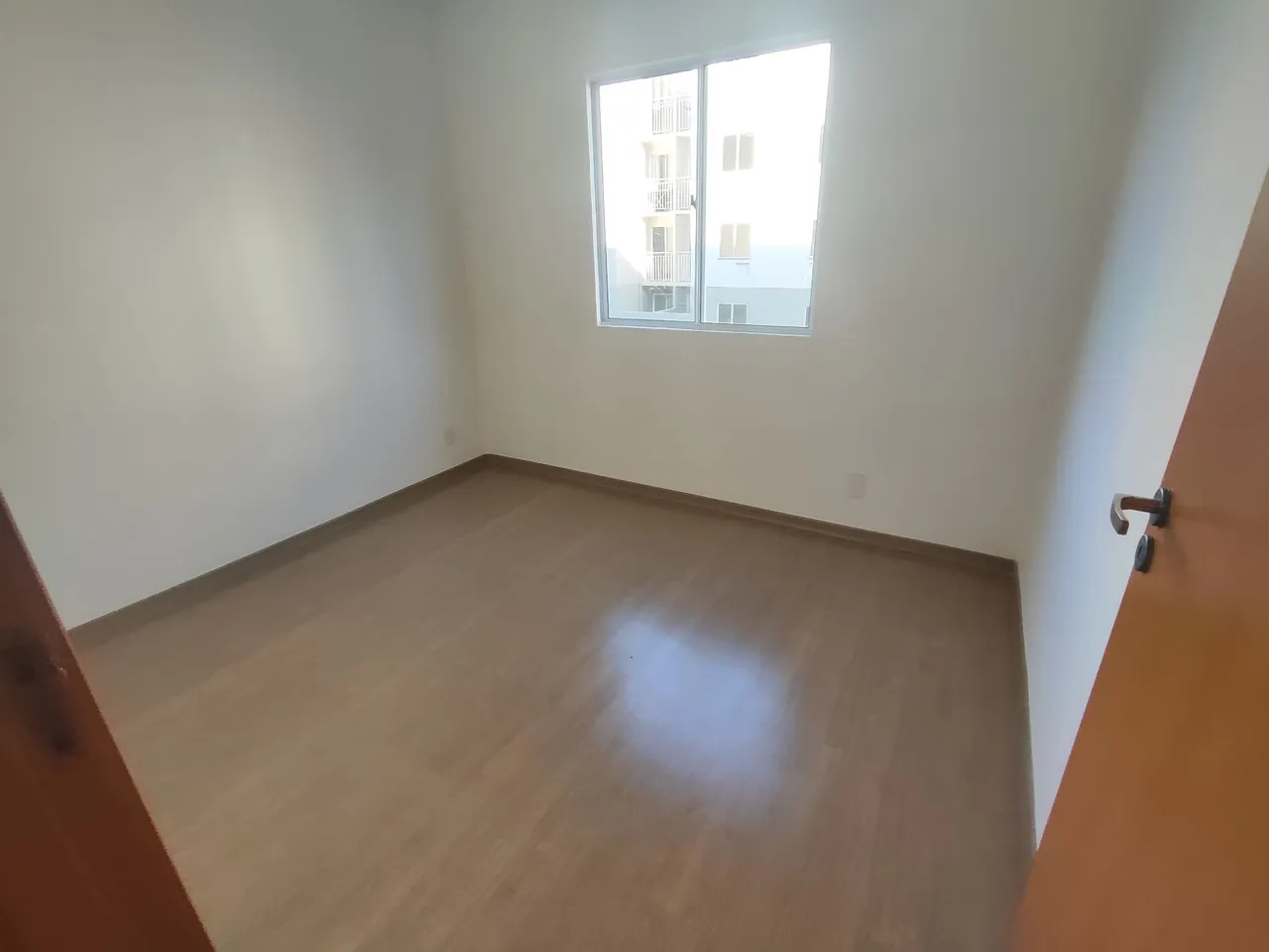 2-bedroom apartment in a building with a pool — photo 19