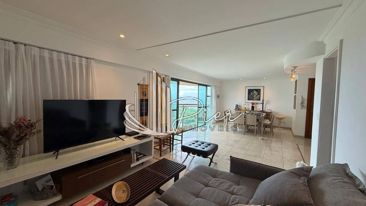 3-bedroom apartment in a building with a heated pool
