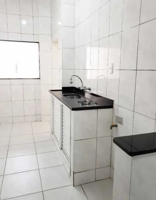 3-bedroom apartment with closed kitchen and laundry area — photo 9