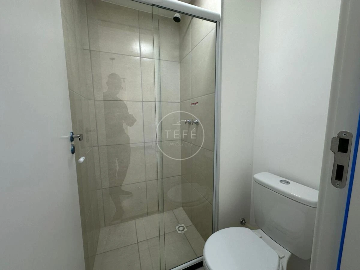One-bedroom apartment in a building with a pool — photo 11