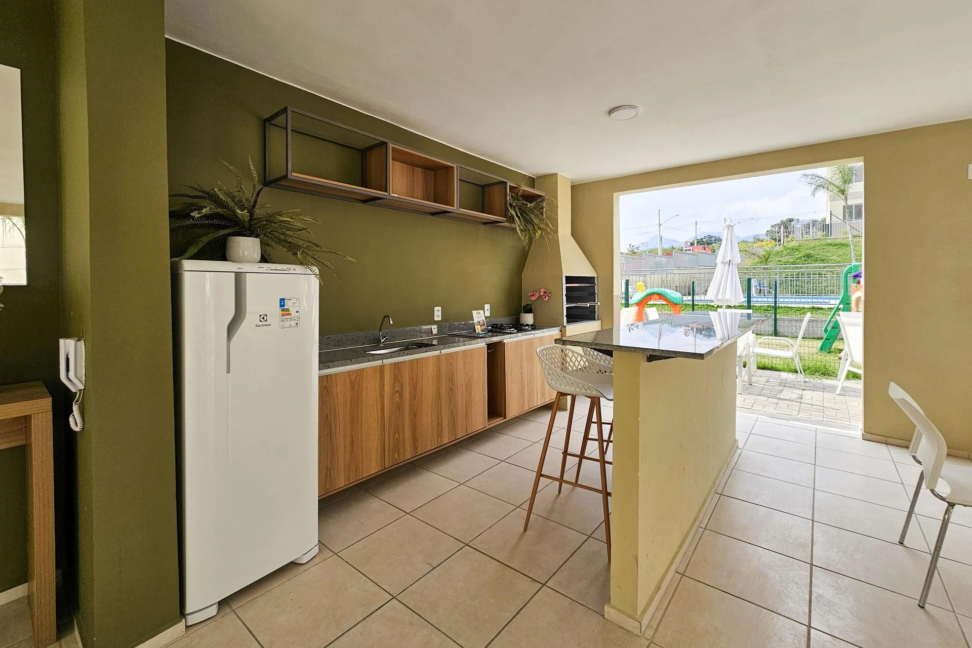 2-bedroom apartment in a building with a pool — photo 15