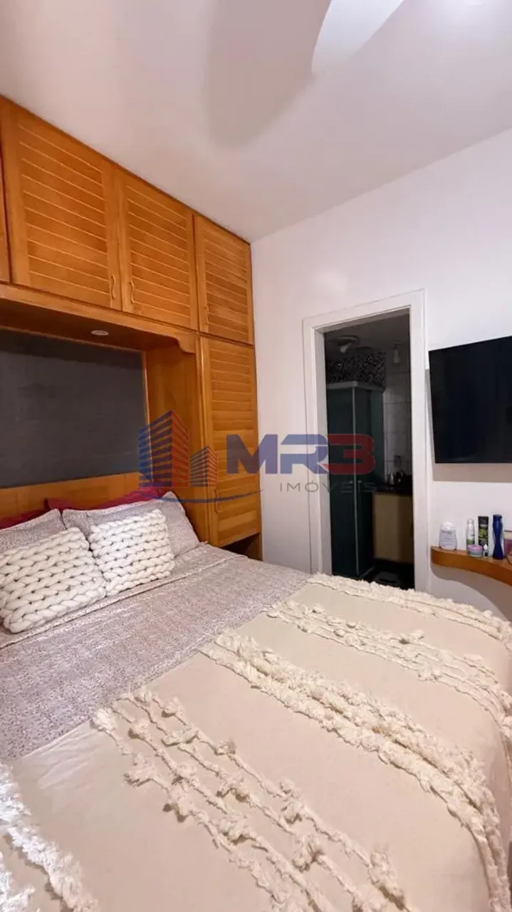 Balcony with a grill in a 2-bedroom apartment, 60 m² — photo 11