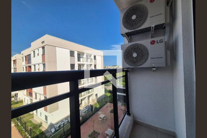 2-bedroom apartment in a building with a pool — photo 10