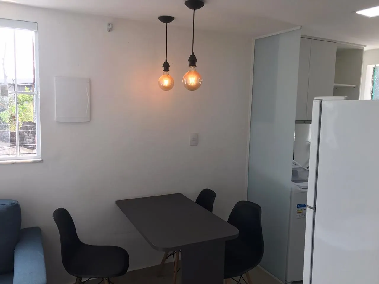 Furnished studio-style apartment with open-plan kitchen — photo 12
