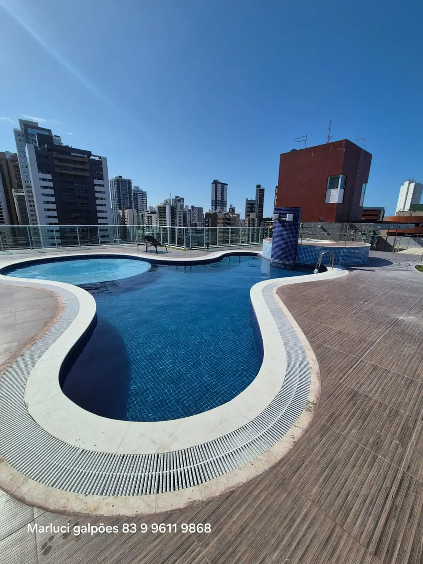 2-bedroom apartment in a building with a pool — photo 10