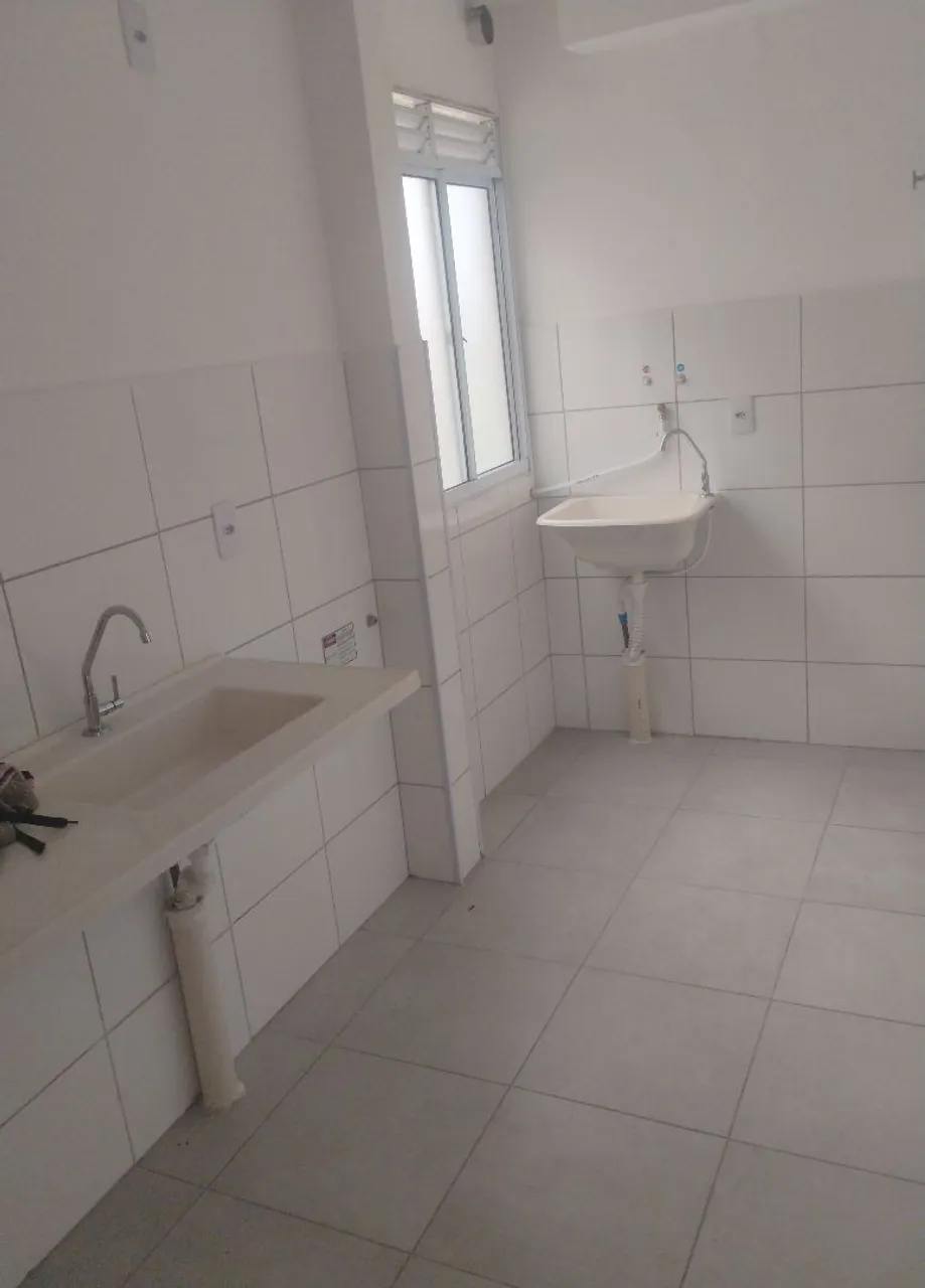 2-bedroom apartment in a building with a pool — photo 2
