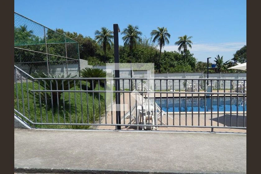 2-bedroom apartment in a building with a pool — photo 29