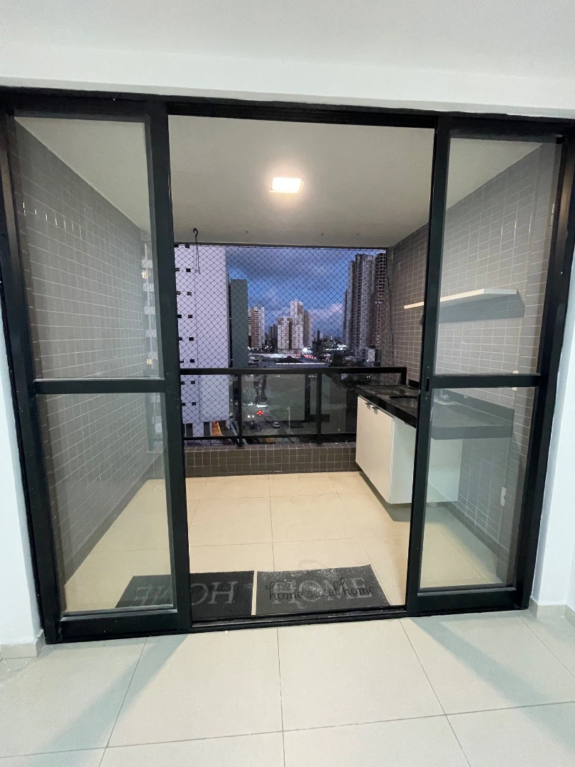 Balcony with a grill in a 3-bedroom apartment, 80 m² — photo 17