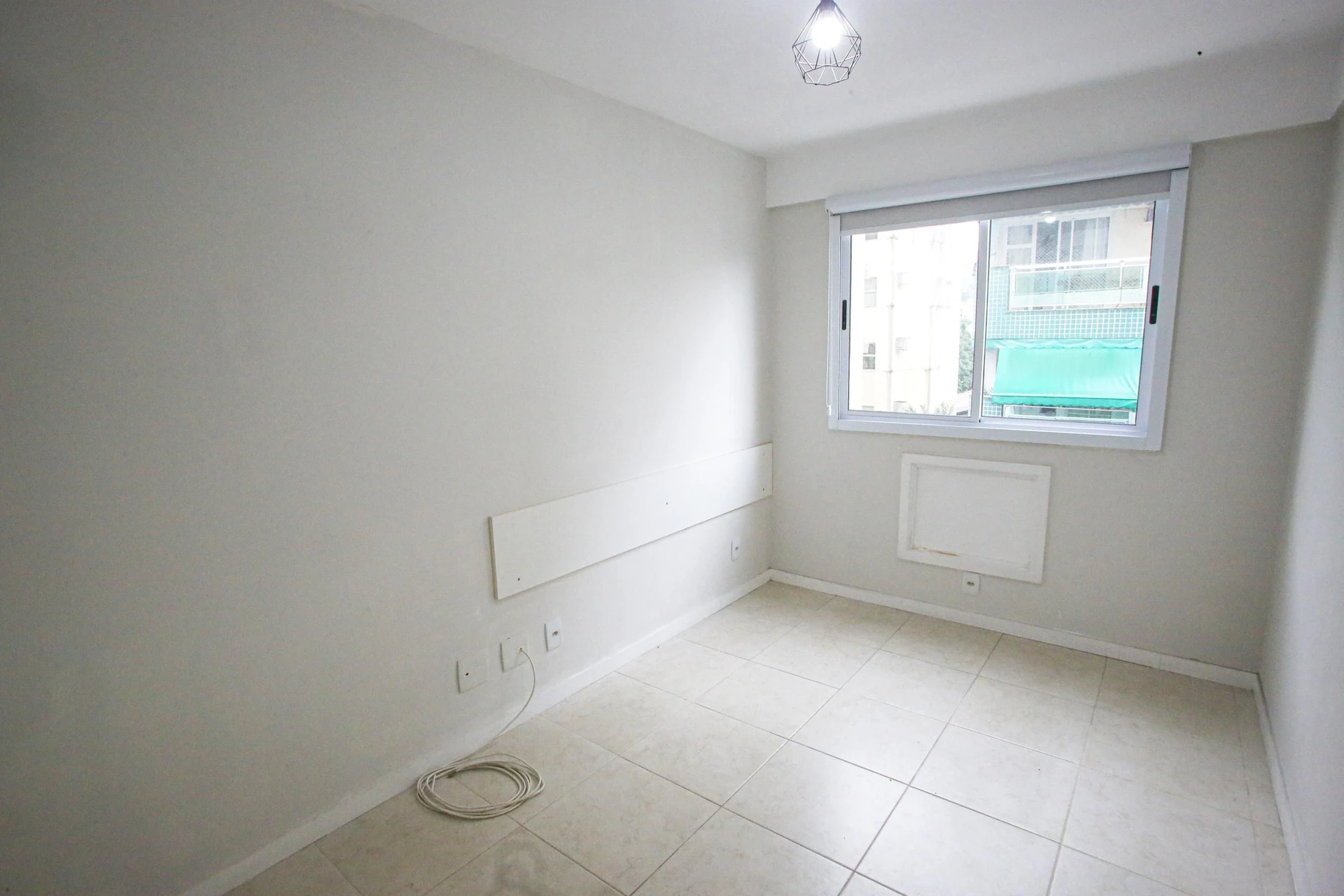 Balcony with a grill in a 2-bedroom apartment, 60 m² — photo 26