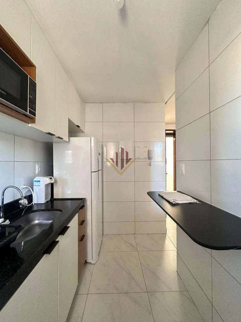 One-bedroom apartment in a building with a pool — photo 2